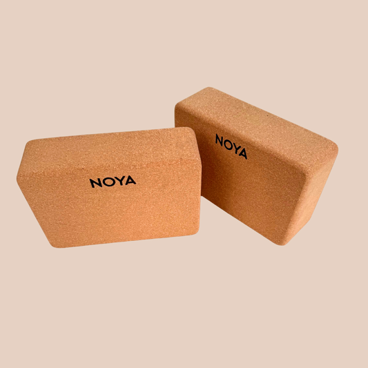 Cork block with 'NOYA' branding, essential for workouts, pilates or yoga