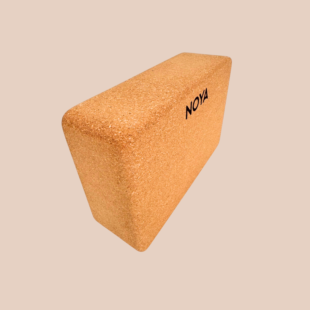Cork block with 'NOYA' branding, essential for workouts, pilates or yoga