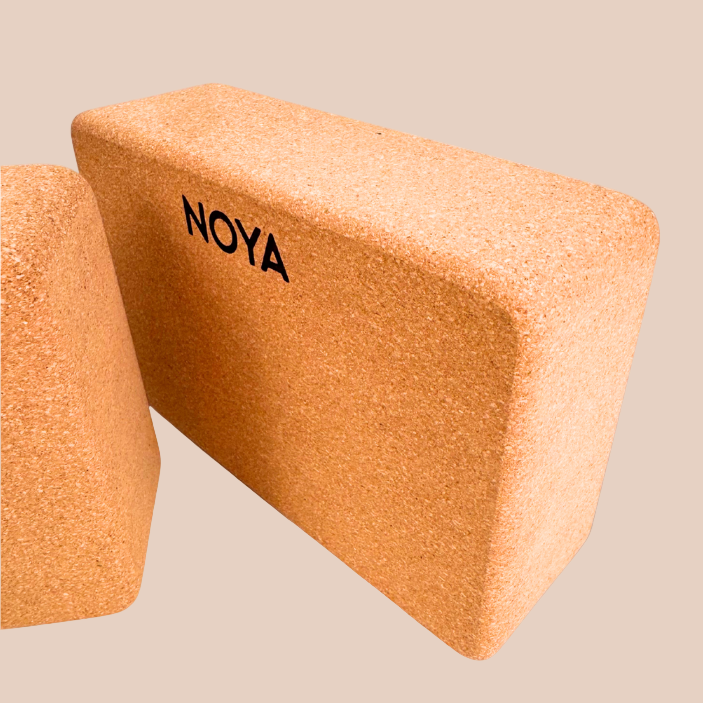 Cork block with 'NOYA' branding, essential for workouts, pilates or yoga