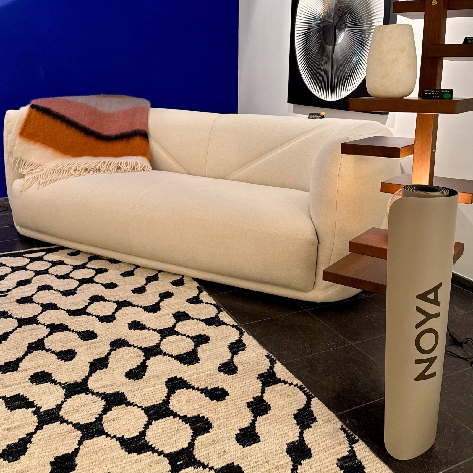 NOYA Elevated Mat — minimalist PU yoga and Pilates mat for modern interiors and mindful movement.