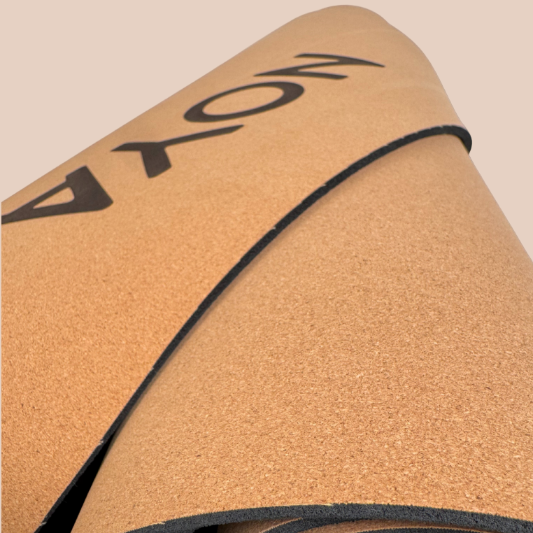 Cork mat with 'NOYA' branding, essential for workouts, pilates or yoga