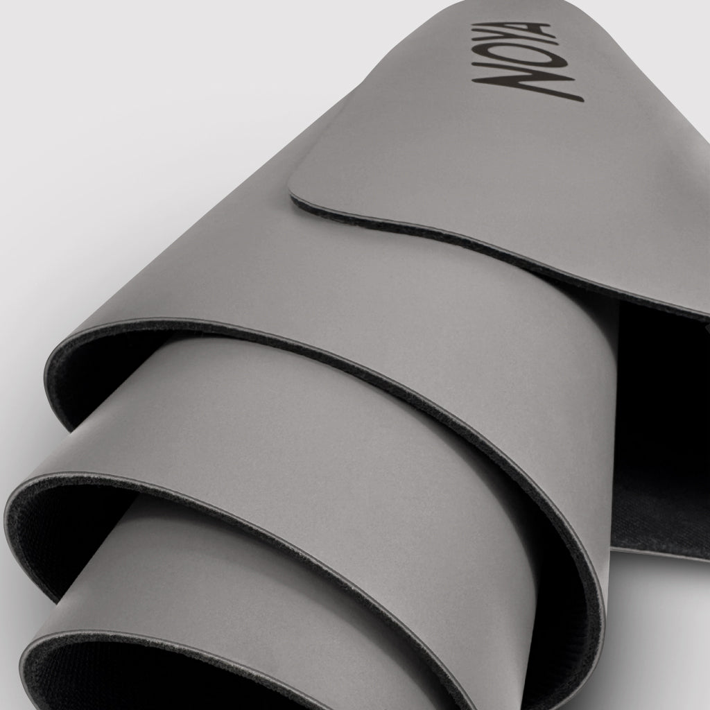 NOYA Elevated Mat in Pebble, rolled
