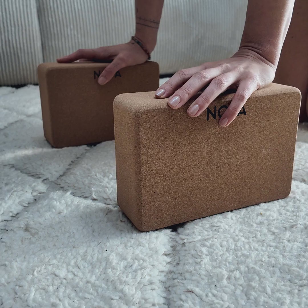 NOYA Cork Block in hand and two blocks stacked