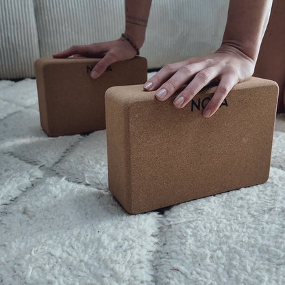 NOYA Cork Block in hand and two blocks stacked